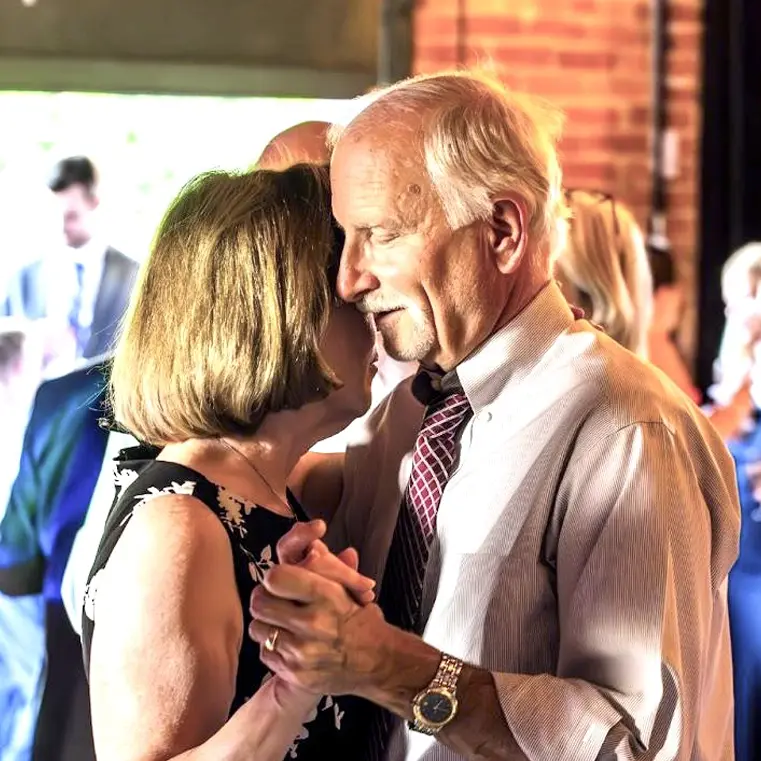Greg-and-Sue-S-Dancing-Frei-Wedding-2023 woman and man slow dancing at a wedding reception